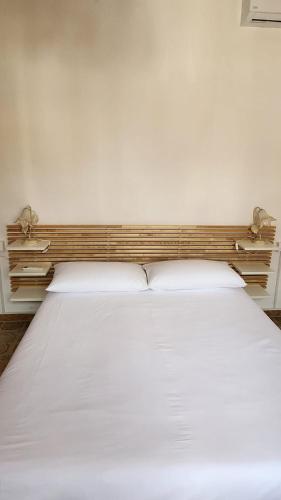 Кровать или кровати в номере Mastro - Apartment with air conditioning