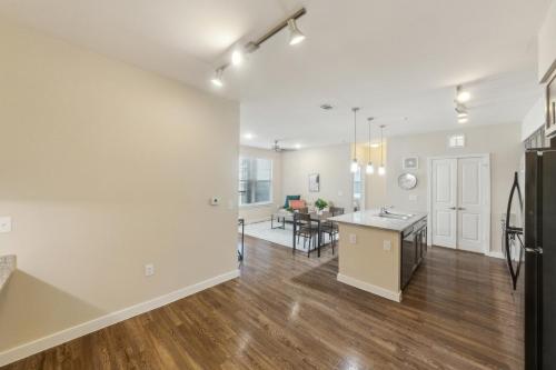 an open kitchen and living room in a apartment at Cullen 3211 I New Construction 2bd Apt I Gated in Houston