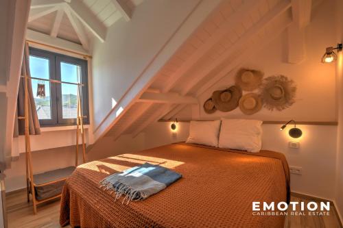 Postel nebo postele na pokoji v ubytování Appartement 2 chambres Alamanda Baie Orientale