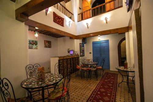 Posezení v ubytování Riad bab merzouga