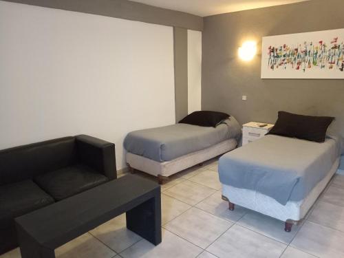 Postel nebo postele na pokoji v ubytování Hotel GBH