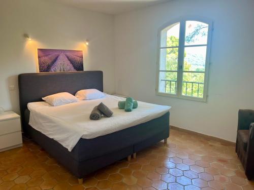 Кровать или кровати в номере B&B naturist Villa Oriél Figanieres