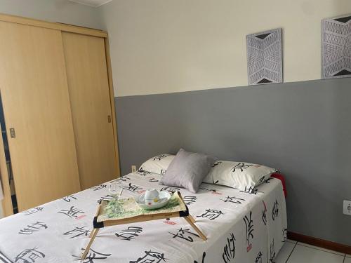 En eller flere senge i et værelse på Studio completo a 200m do shopping Iguatemi