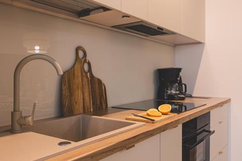 Η κουζίνα ή μικρή κουζίνα στο Let's Sea by 2HomeRent
