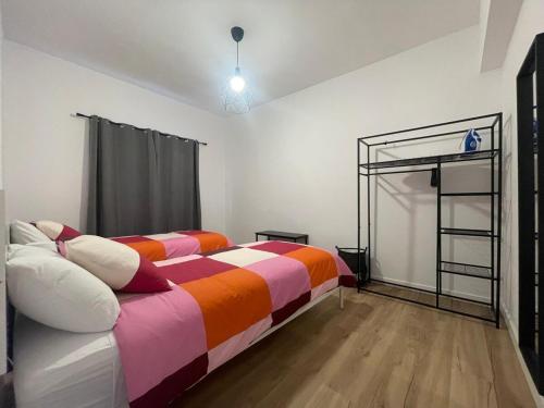 Ένα ή περισσότερα κρεβάτια σε δωμάτιο στο La Casa de Mercedes