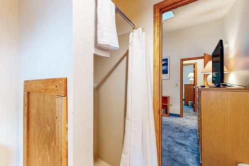 a hallway with a door leading into a room at Locke Mountain A6 in Newry