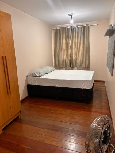 Ένα ή περισσότερα κρεβάτια σε δωμάτιο στο Casa com 4 quartos e hidro, garagem 4 carros