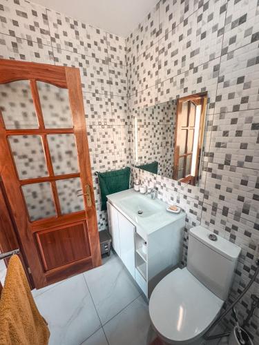 Un baño de Bentub Home pousada