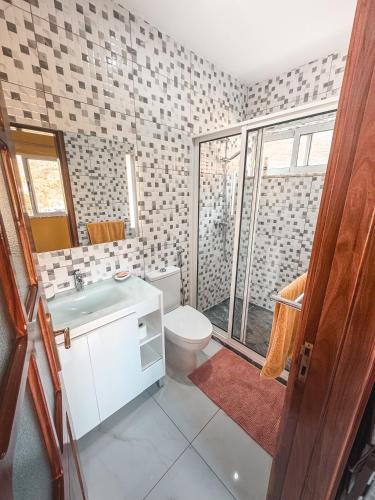 Un baño de Bentub Home pousada