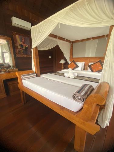 Katil atau katil-katil dalam bilik di Beji Ayu Villas Sidemen