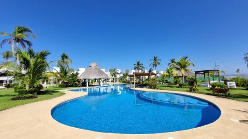 a pool at the resort at Casa Acapulco Playa Bonfil in Acapulco