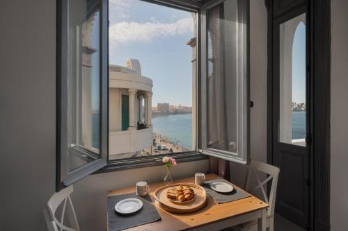 grey l studio apartments Corniche Alexandria Little Venice