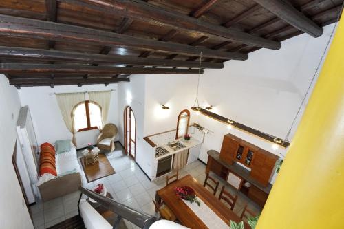 an overhead view of a kitchen and living room at Casa Stella Di Madel in Flumini di Quartu