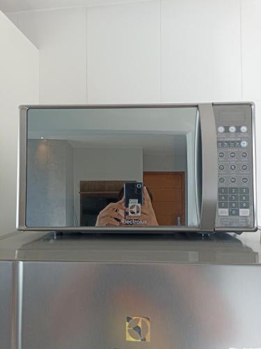 Kuchyň nebo kuchyňský kout v ubytování Excelente e moderno apartamento com linda vista