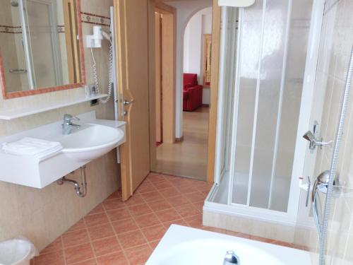 Ванная комната в Residence Milandora