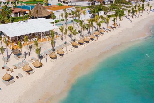 an aerial view of the beach at the excellence punta cana resort at Akumal Seabreeze Private Hot Tub Beach Access 11 Pools in Akumal