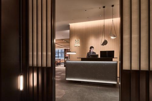 Lobi atau kawasan kaunter penerimaan di Ming Hotel Nanjing - MGallery Collection