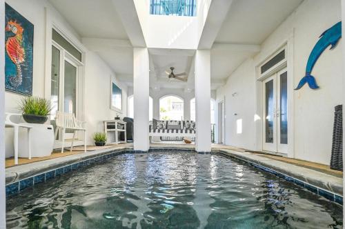 an indoor swimming pool in a home with a swimming poolvisorvisor at Emerald View on 30A in Santa Rosa Beach
