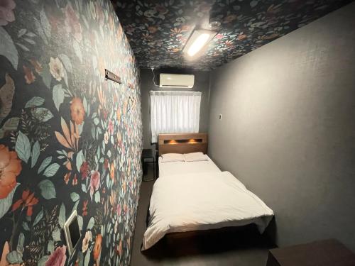 Postel nebo postele na pokoji v ubytování Hotel Sunplaza
