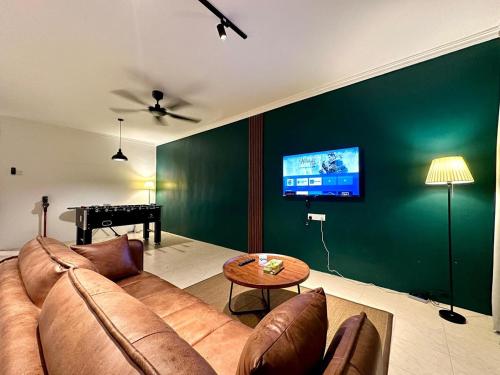 TV a/nebo společenská místnost v ubytování BNB Cozy Homestay - Cyberjaya, 14 pax