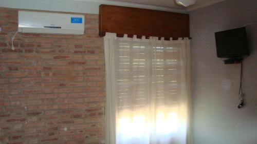 Televisyen dan/atau pusat hiburan di Principado Sierras Hotel