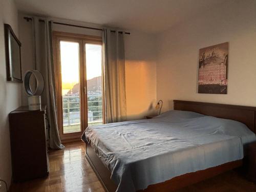 En eller flere senge i et værelse på Villa Nova Premium Apartment No 8