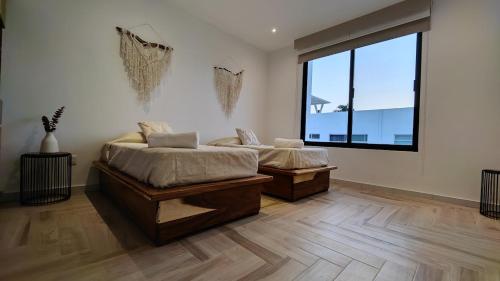 Postel nebo postele na pokoji v ubytování BNAYAR Tortugas 38, con acceso al Club de Playa