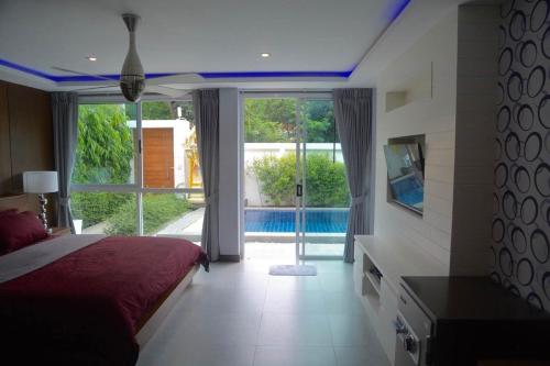 Postel nebo postele na pokoji v ubytování Samui Luxury Pool Villa Tawan