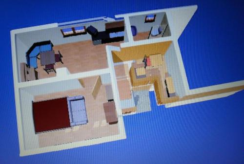 a floor plan of a house with a bedroom at Ferienwohnung Stricker in Obertraun