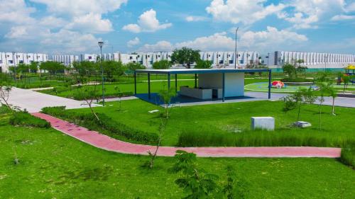 a park with a pavilion in the middle of a park at Casa Moderna con Alberca en Morelos in Xochitepec