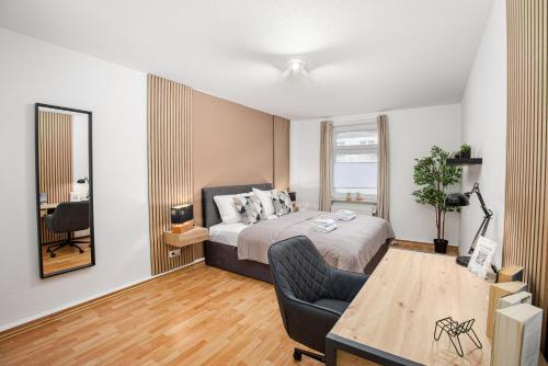 Katil atau katil-katil dalam bilik di Central Essence Apartment I Zwei Schlafzimmer I Küche I Parken I Waschmaschine I Smart-TV I WLAN
