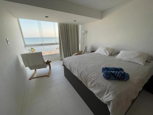 Ένα ή περισσότερα κρεβάτια σε δωμάτιο στο Modern Seaside Retreat, 3BR, Unbeatable Views