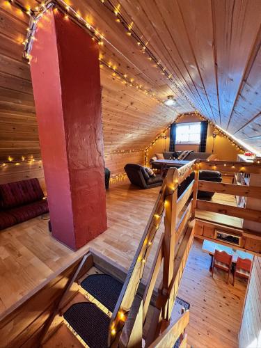 an overhead view of a room with a wooden ceiling at TheHideaway in Sel