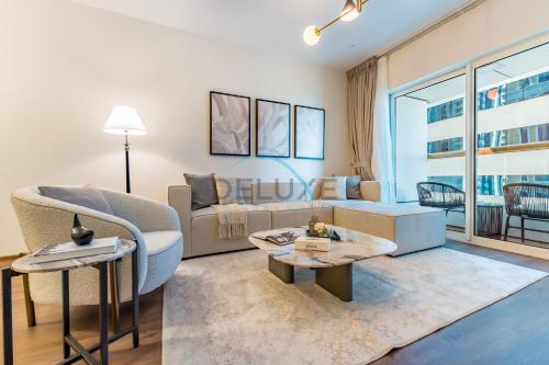 Revamped 1BR Unit with Partial Sea & Palm Jumeirah Views Close to Beach , Elite Residence, Dubai Marina by Deluxe Holiday Homes