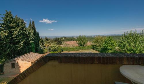 a view from the roof of a house at Agriturismo Palazzo Bandino - Wine cellar, on reservation restaurant and spa in Chianciano Terme