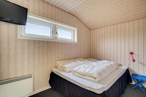 Postel nebo postele na pokoji v ubytování Bjålum