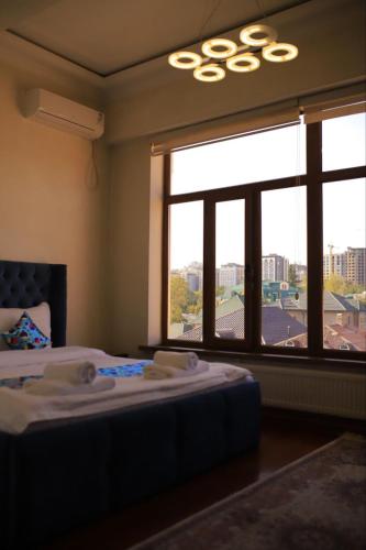 Ένα ή περισσότερα κρεβάτια σε δωμάτιο στο CITY GARDEN HOTEL