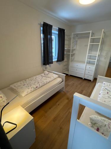 Ένα ή περισσότερα κρεβάτια σε δωμάτιο στο Apartments Oliver, Axams