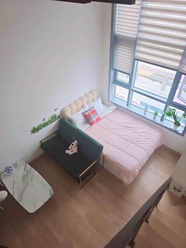 Postel nebo postele na pokoji v ubytování Okjeong view