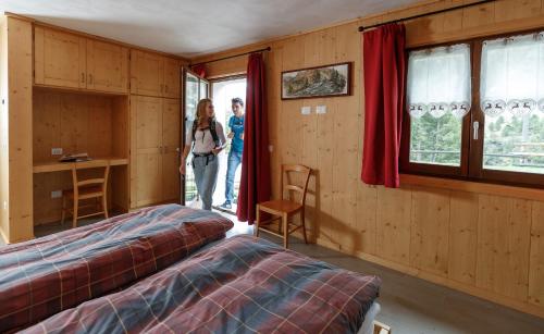 Postel nebo postele na pokoji v ubytování Rifugio Ghiacciaio dei Forni