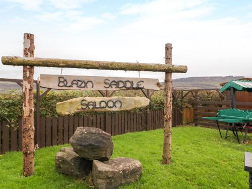 a sign for a bar soap school in a yard at Apache Falls Lodge in Limavady