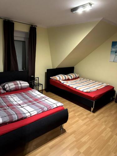 Postel nebo postele na pokoji v ubytování Large apartment for 3-10 people near Halle and Leipzig