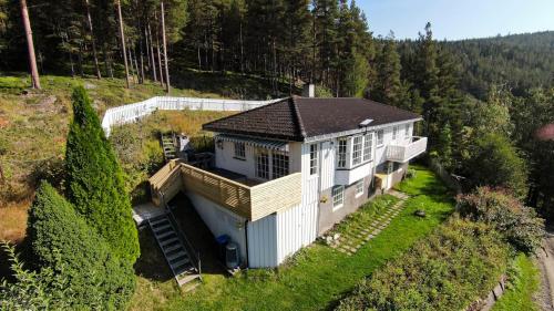 an overhead view of a house on a hill at ThePearl in Sel