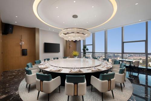 a large conference room with a large table and chairs at Crowne Plaza Taizhou City Center by IHG in Taizhou