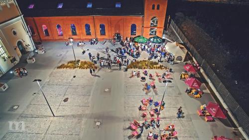 an overhead view of a group of people in a building at Pokoje Gościnne Stara Kopalnia in Wałbrzych