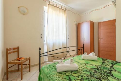 Ένα ή περισσότερα κρεβάτια σε δωμάτιο στο Agriturismo Buen Camino