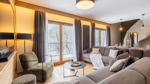 Ruang duduk di Résidence & Spa Les Cîmes d'Auréa