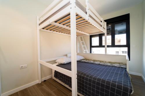 En eller flere senge i et værelse på BM5J, Big duplex penthouse with two terraces