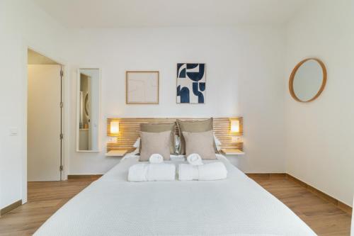 Ένα ή περισσότερα κρεβάτια σε δωμάτιο στο Livinn House - Self Check in