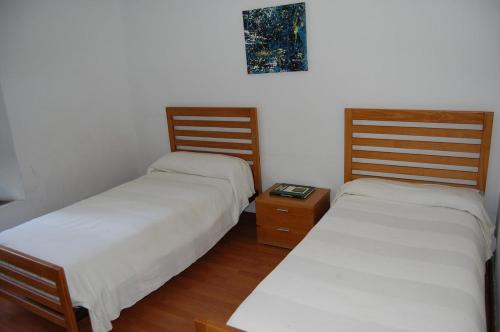 Postel nebo postele na pokoji v ubytování Fantástico chalet en Sevilla